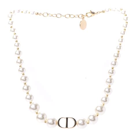 gold dior necklace with pearl